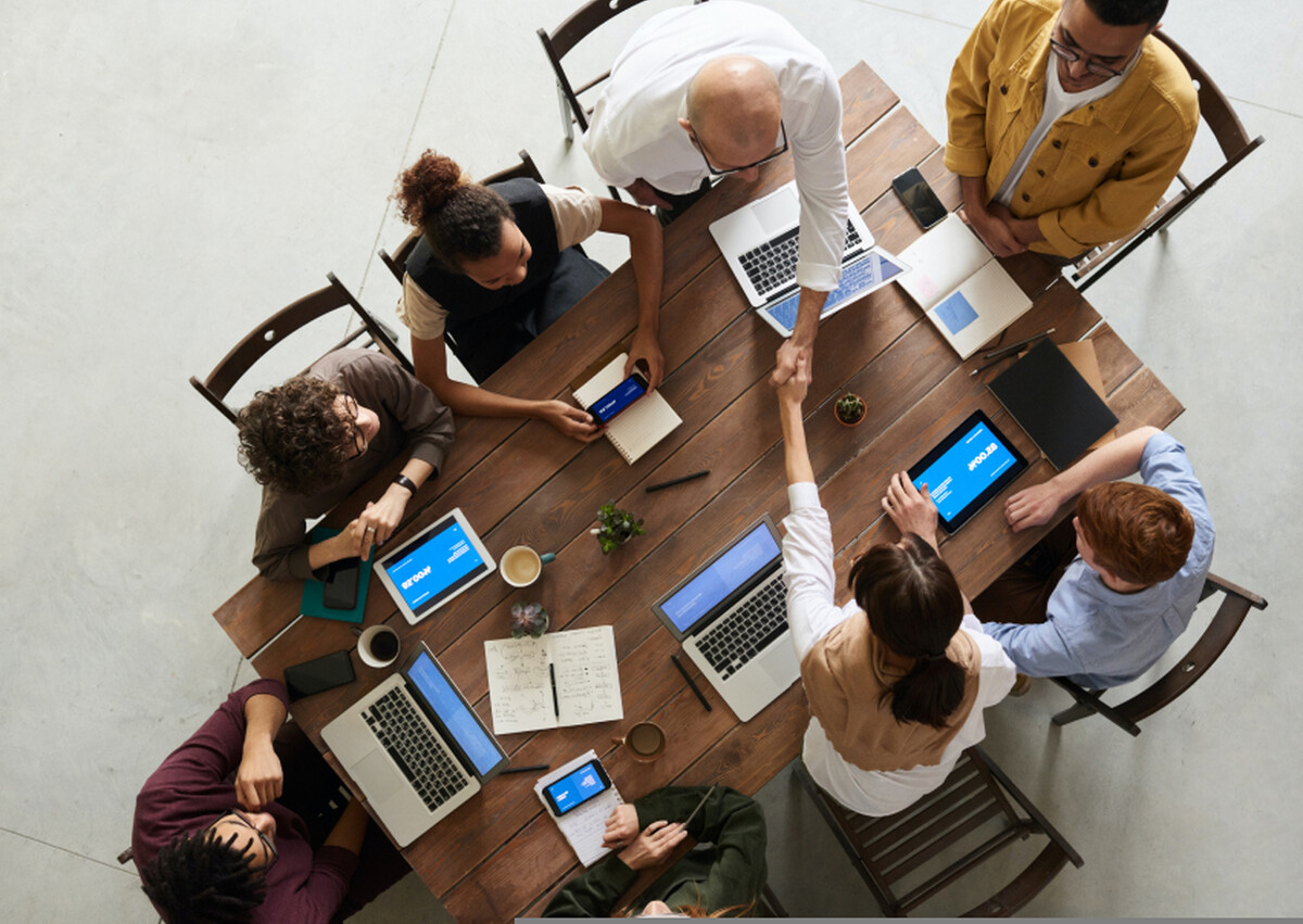 Team around the desk 1
